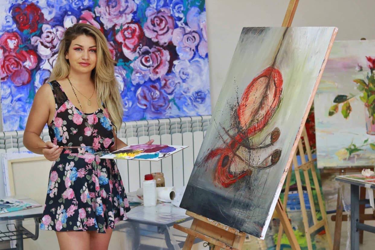 An artist and a humanitarian: selling her artwork to help those in need